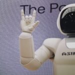 Asimo robot doing handsign